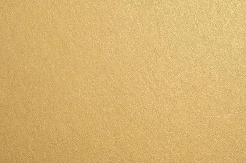 Golden shimmering background texture creating sparkling abstract pattern Stock Photos