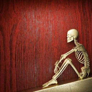 Golden skeleton on wood Stock Illustration