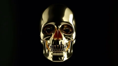 golden-skull-appearing-dark-black-footage-081277824_iconl.jpeg