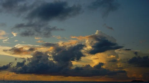 Golden sky and clouds at sunset. Slow motion. Stock Footage 101471702