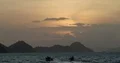 Golden sky sunset and island hills at Flores Sea in Indonesia 4k or 4k+ Resolution