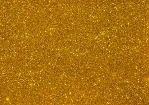 Golden Small Glitter Particles Texture Stock Photos