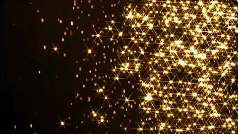 Golden spark particles exploding in dark space. Abstract motion graphics with gl Stock Footage 340456469