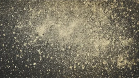 Golden sparkle falling in slow motion  glittering dust particles in darkness Stock Footage 314165743