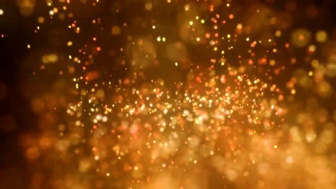 Golden sparkle particles exploding in dark space. Abstract motion graphics with  库存影片 340456554