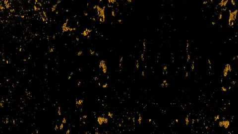 Golden sparks float against a deep black background or overlay background Stock Illustration