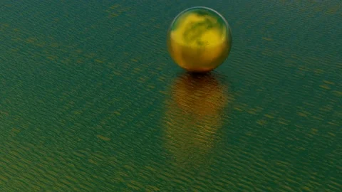 A golden sphere with texture rolls on the green floor. looped animation. 3d rend Stock Footage 175910912