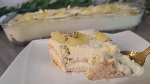 Golden Spoon Taking a Bite of Pineapple No-Bake Cake - HD Stock Footage Stock Footage 343878330