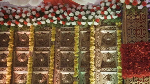 Golden squares background decorations inside Indian Hindu wedding with bells Stock Footage 300603284