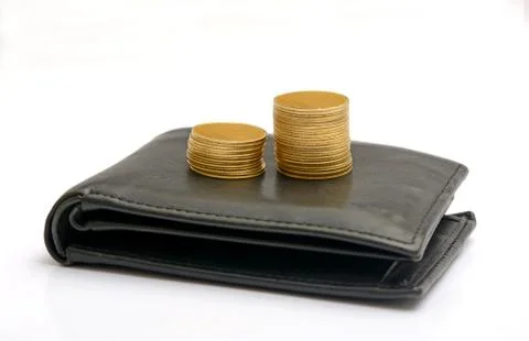 Golden Stack of Coins on Purse - saving concept Foto stock
