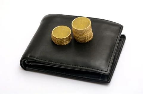 Golden Stack of Coins on Purse - saving concept Foto stock