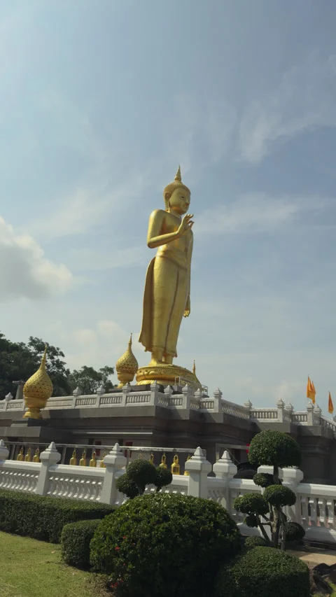 Golden Standing Buddha Statue at Hat Yai Municipal Park Thailand Stock Footage 340459675