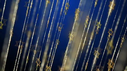 Golden Stars of David on thin threads rotate. Animated blue background Stock Footage 234166767