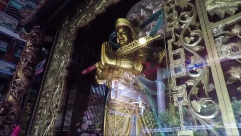 Golden Statue at Altar Inside Kek Lok Si Buddhist Temple, Penang, Malaysia Stock Footage 296866077