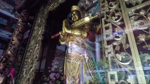 Golden Statue at Altar Inside Kek Lok Si Buddhist Temple, Penang, Malaysia Stock Footage 296866136