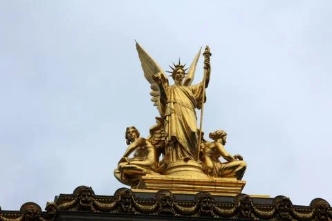 Golden statue of Angel on the top of the Garnier Opera in Paris Stock Photos