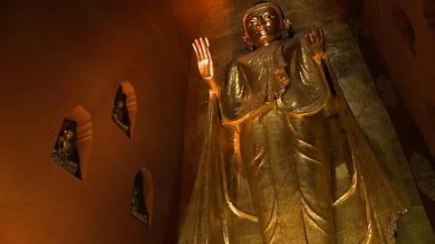 A golden statue of buddha standing Stock-Footage 112698591