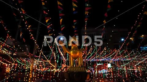 Golden statue of mythical creature guarding a temple Stock Photos