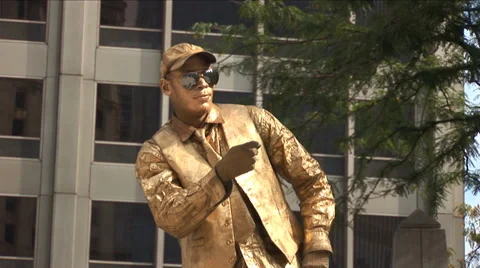 Golden statule actor play Stock Footage 34170276