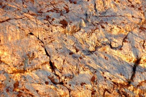 Golden stone texture. Minerals pattern. Abstract background. Stock Photos