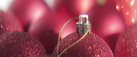 Golden string of red Christmas ball 4K scope sliding video Stock Footage 317161448
