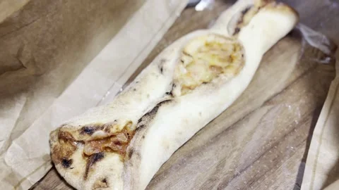 Golden Stuffed Bread Roll with Melted Cheese Vídeo Stock 345339316
