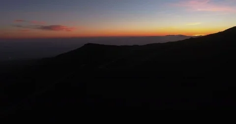 Golden Sun during sunset at Mount Etna, Sicily Stock Footage 77099150