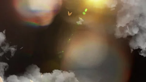 Golden sun flare in dark cloudy sky. Abstract background with bright light and Stock Footage 341304827