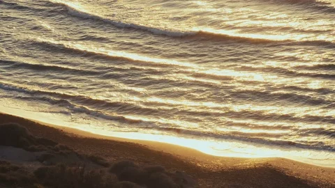 Golden sun reflaction on waves Stock Footage 73913721