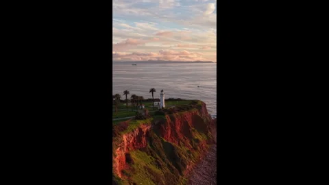Golden Sun Reflection on Coastal Cliffs Stock Footage 328063353
