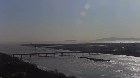 Golden Sun Reflection Moving on Sea Surface in Xiamen China. Stock Footage 330378730