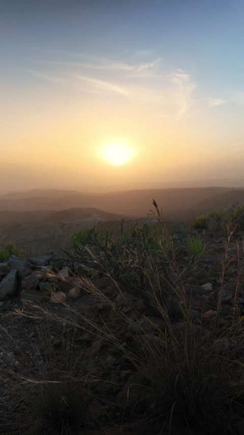 Golden sun setting over the dusty mountain peaks of the Canary Islands Video stock 331080124