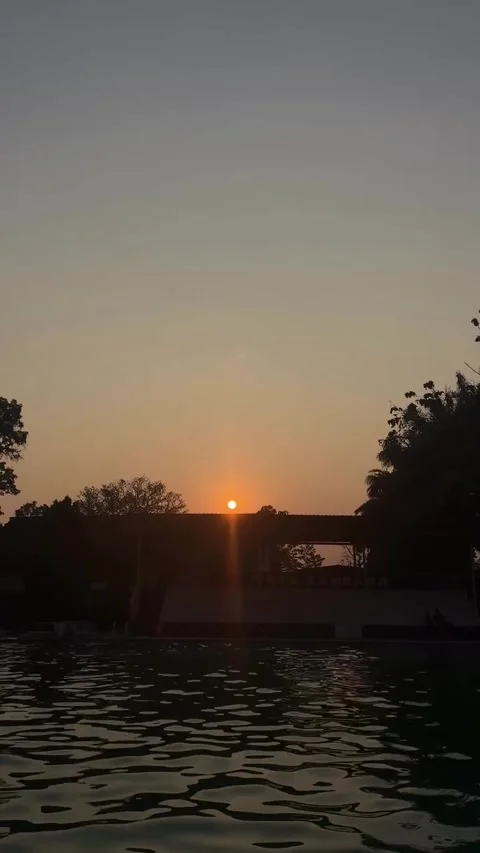 Golden Sun Setting Over Swimming Pool Water Stock Footage 341319262
