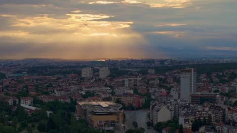 Golden sunbeams breaking through clouds over Sofia Video stock 340012076
