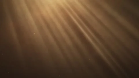 Golden sunlight rays streaming through dusty atmosphere with textured 库存影片 340942368