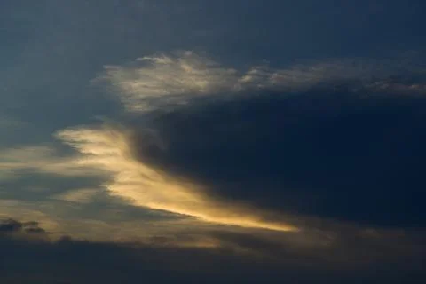 The golden sunlight shining through the clouds in Nanning at dusk Stock Photos