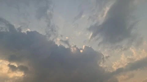 Golden Sunlight Shining Through Heavy Storm Clouds. Stock Footage 330179036