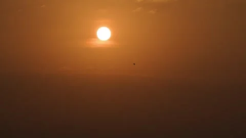 Golden Sunrise Above Clouds with Dramatic Orange Sky Time Lapse Stock Footage 346757933