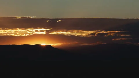 Golden Sunrise Behind Thin Layer of Clouds Timelapse Zoom In Video stock 201879312