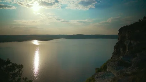 Golden sunrise with dramatic cloudscape over the sea video Stock Footage 107807746