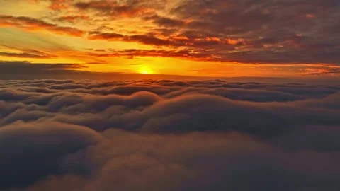 Golden Sunset Above Clouds with Dramatic Orange Sky Vídeo Stock 342489972