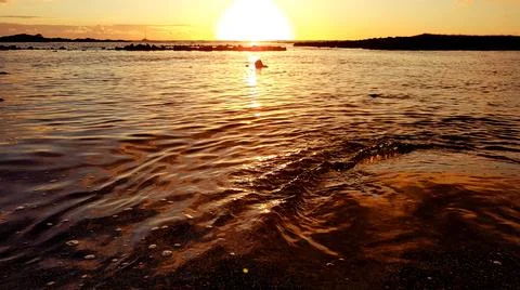 Golden sunset at Alula beach (full of turtles) - Hawai - Big Island Stock Photos