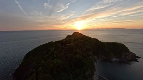 Golden Sunset Cliffs and Ocean at Wakayama – FPV Drone Aerial Cinematic Video stock 335703510