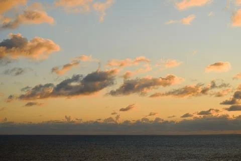 Golden Sunset Cloud Formation Above Atlantic Ocean Horizon Near Saint Ives. Stock Photos