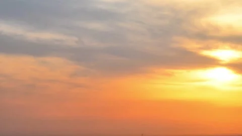 Golden Sunset Clouds Against Deep Blue Sky. Dramatic Evening Sky Background. 4K. Stock Footage 339771812