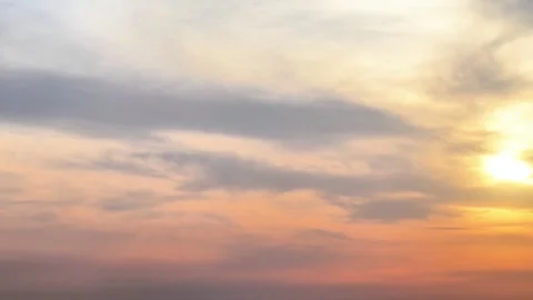 Golden Sunset Clouds Against Deep Blue Sky. Dramatic Evening Sky Background. 4K. Stock Footage 339771874