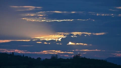 Golden Sunset Clouds over Dark Hills and Lake Stock-Footage 345034506