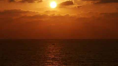 Golden sunset with clouds over the sea or ocean. Timelapse video Stock Footage 73449286