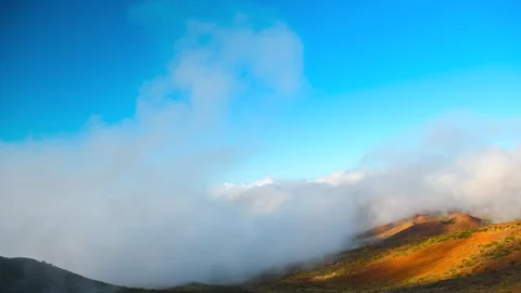 Golden Sunset Clouds Rolling Over Volcanic Hill Tenerife 4K Timelapse Stock Footage 334398714
