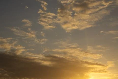 Golden Sunset Clouds in the Sky Photos
